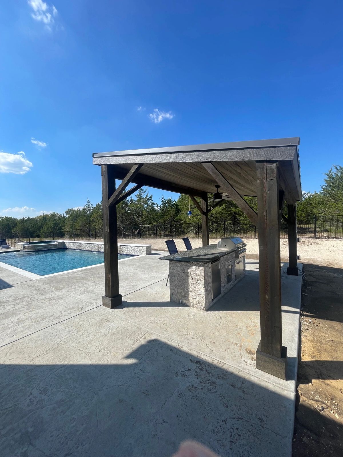 Covered outdoor kitchen and entertaining patio